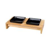 Un conjunto de tazones negros en un soporte de madera/cerámica de 2 × 0.2 l