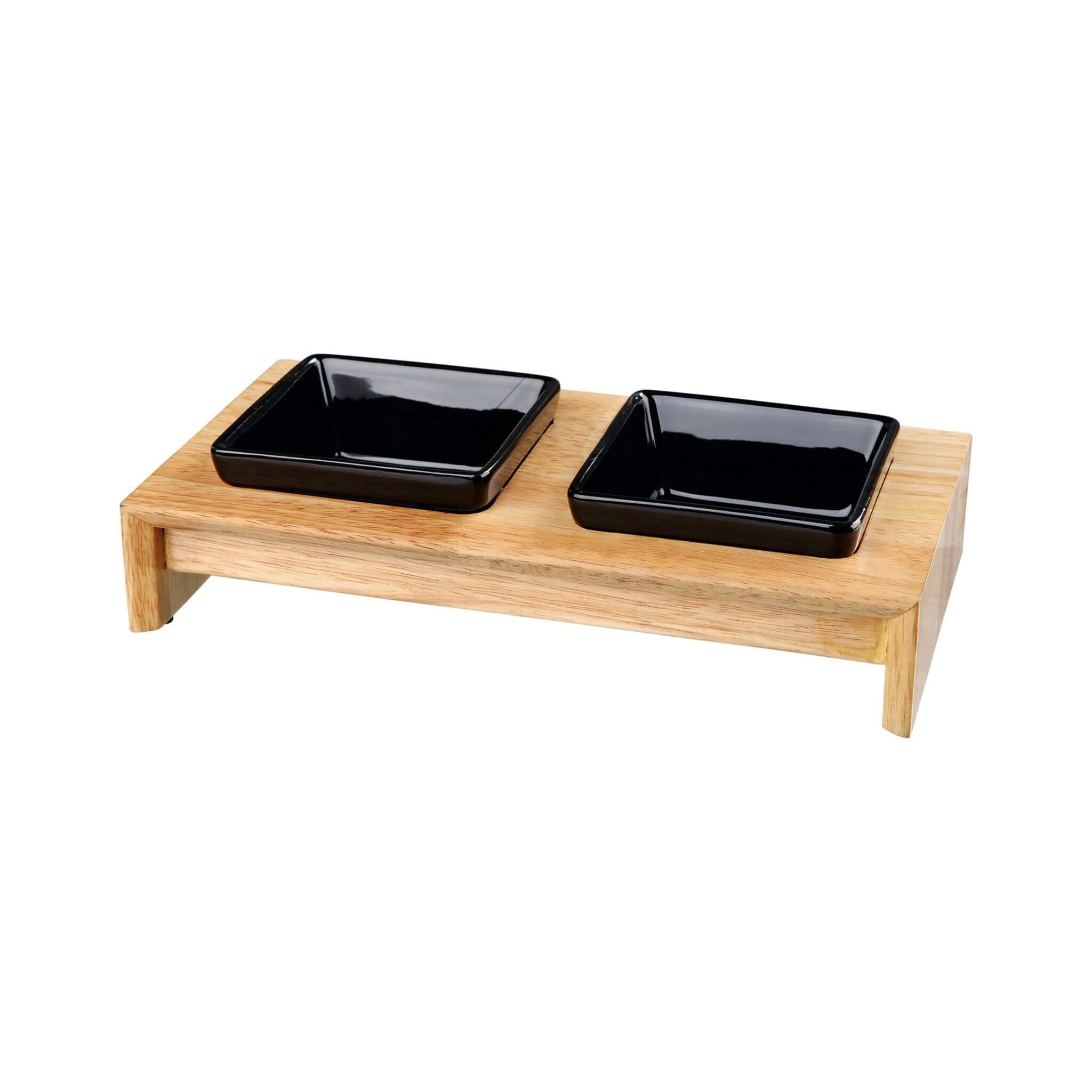 Un conjunto de tazones negros en un soporte de madera/cerámica de 2 × 0.2 l
