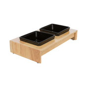 Un conjunto de tazones negros en un soporte de madera/cerámica de 2 × 0.2 l